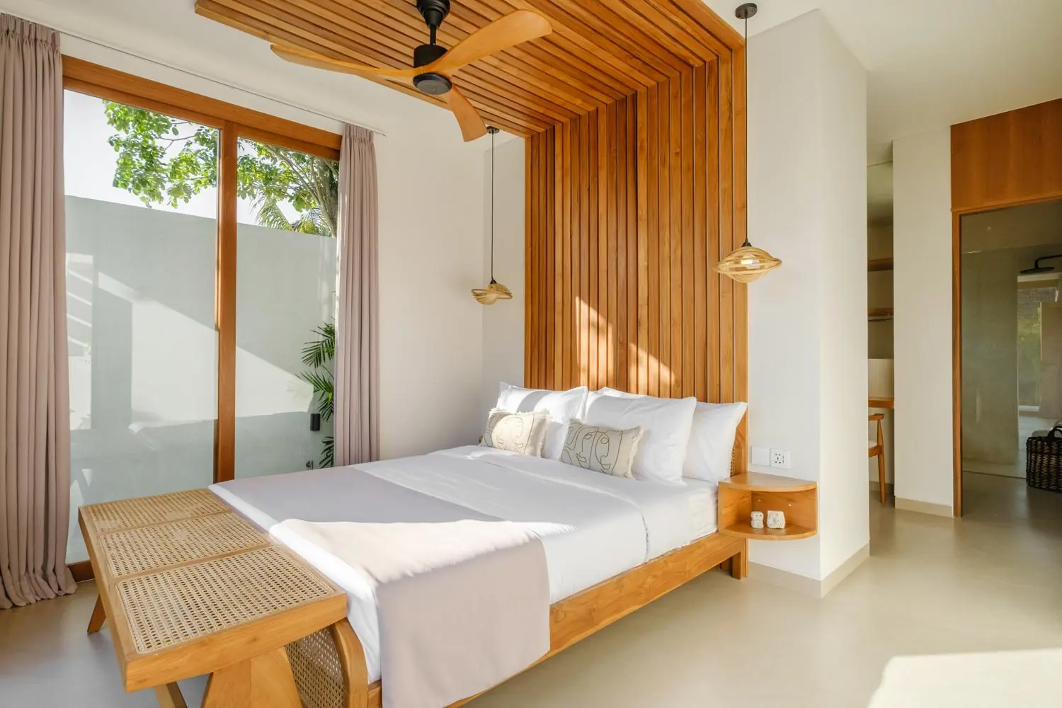 Bedroom with slatted timber headboard wall Villa Las Hermanas Tumbak Bayu Pererenan Bali
