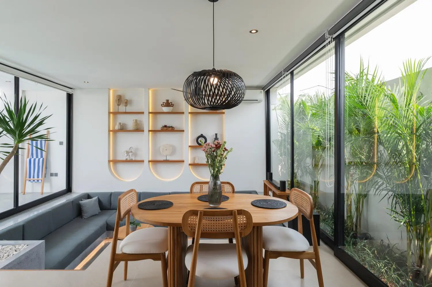 Round dining table and sunken lounge Villa Julito Tumbak Bayu Pererenan Bali