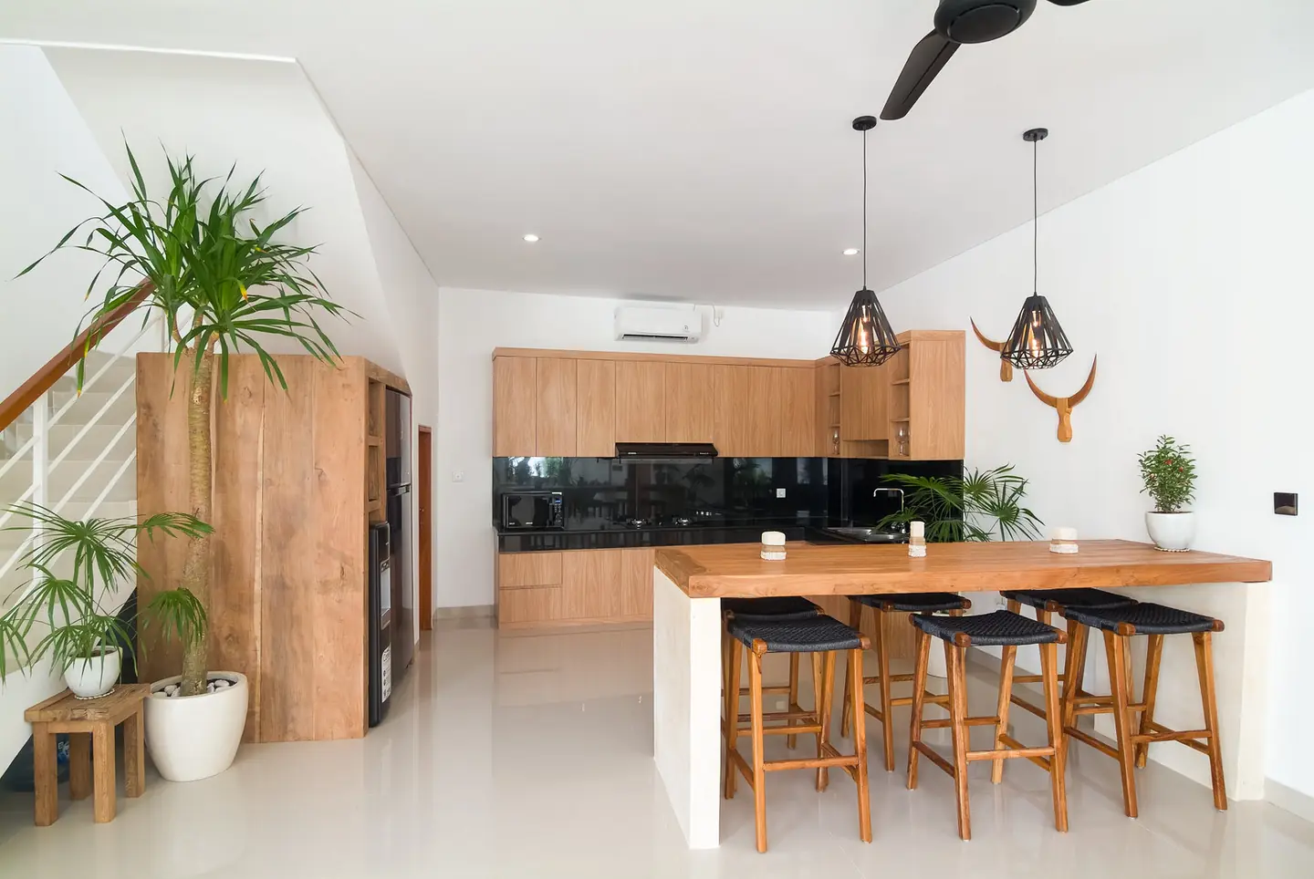 Villa Kesari kitchen with teak breakfast bar Berawa Canggu Bali