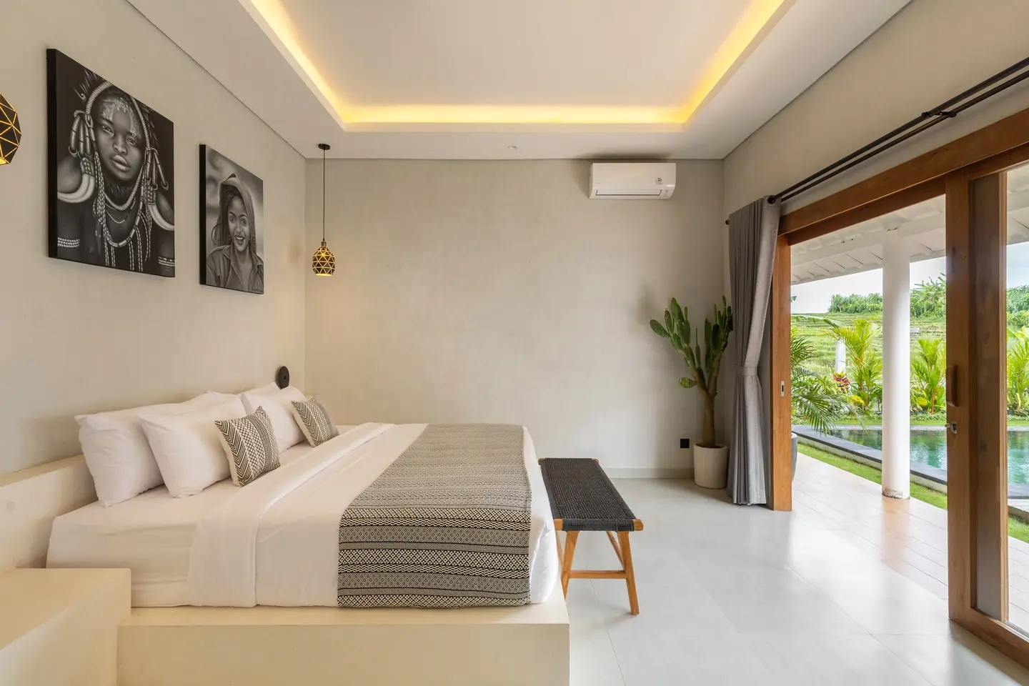 Villa Menaka bedroom with rice field and pool view Tumbak Bayu Pererenan Bali