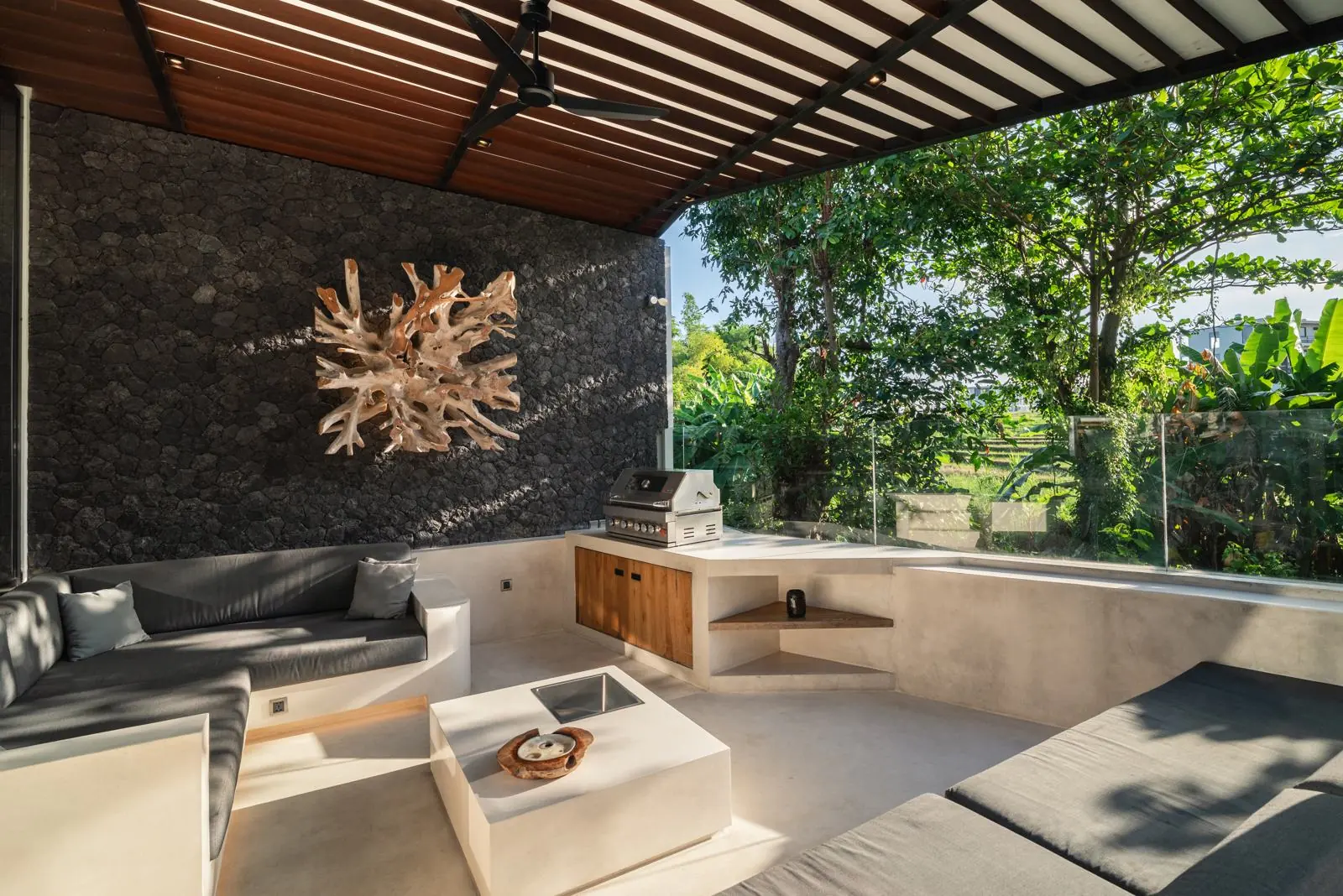 Sunken BBQ lounge overlooking the rice fields River Paradise 5BR Pererenan Bali