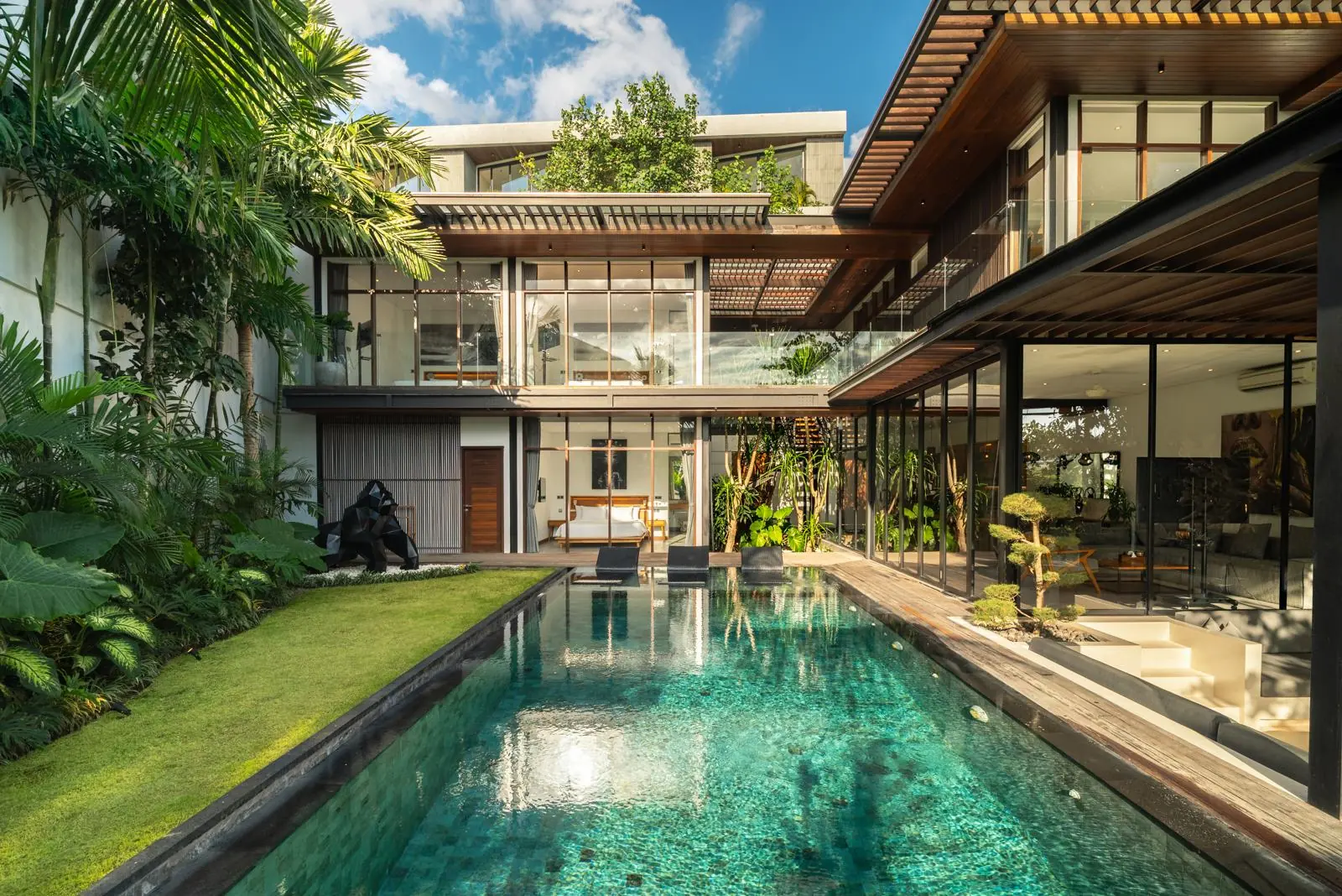 Private pool, lawn and two-storey glass villa River Paradise 5BR Pererenan Bali