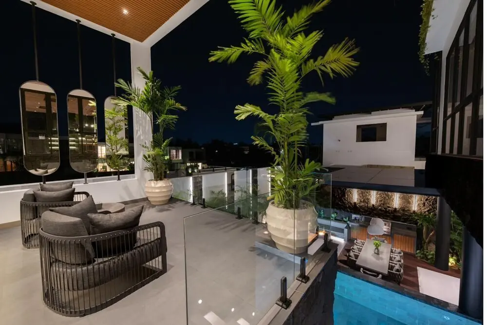 Balcony overlooking the pool at night MAR Bali 1 Pererenan Bali