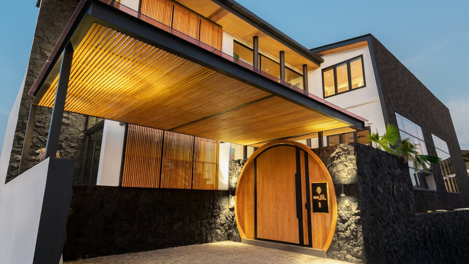 Iconic circular entrance volcanic stone MAR Bali 1 luxury villa Pererenan Bali