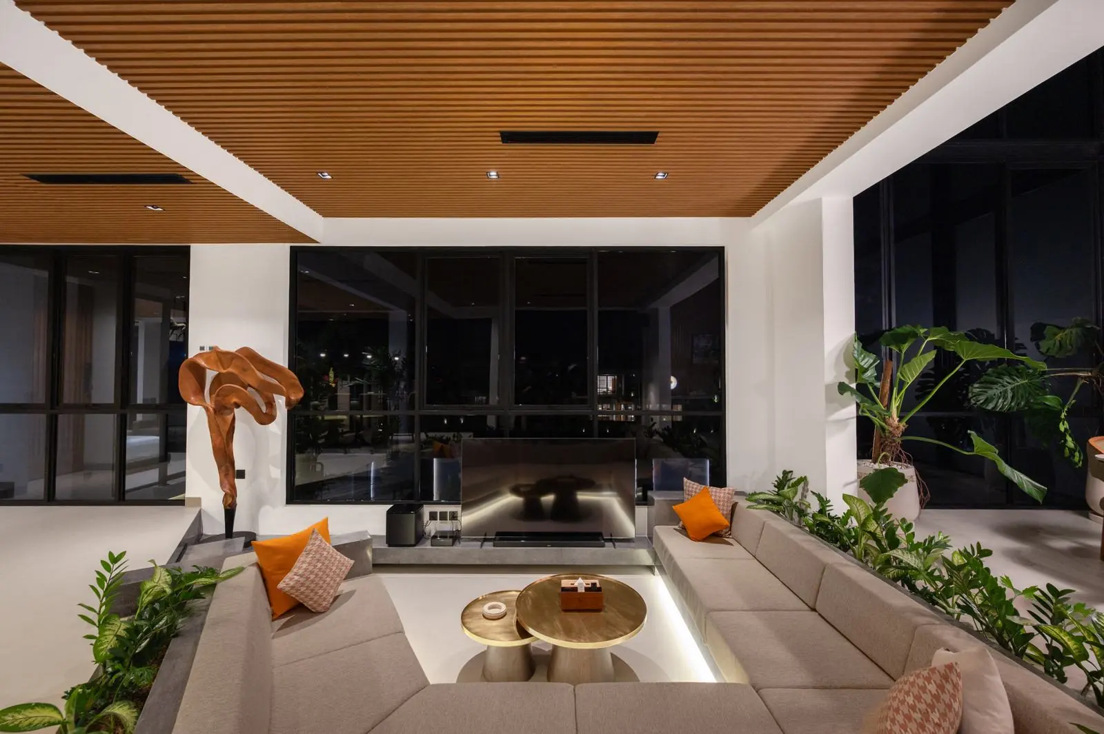 Sunken living room with sculpture at night MAR Bali 1 luxury villa Pererenan Bali