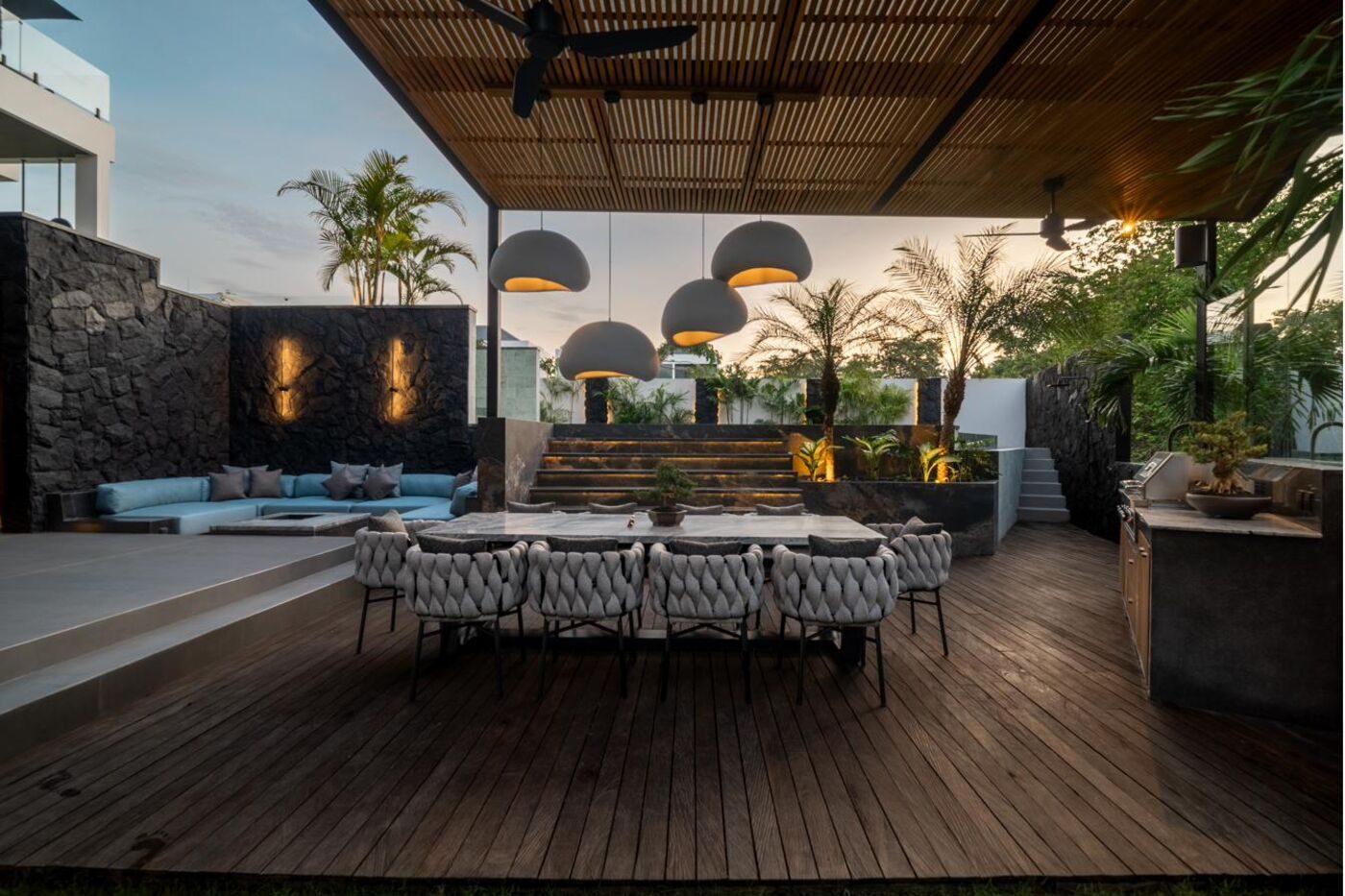MAR Bali 2 outdoor living area with BBQ and volcanic stone wall Pererenan